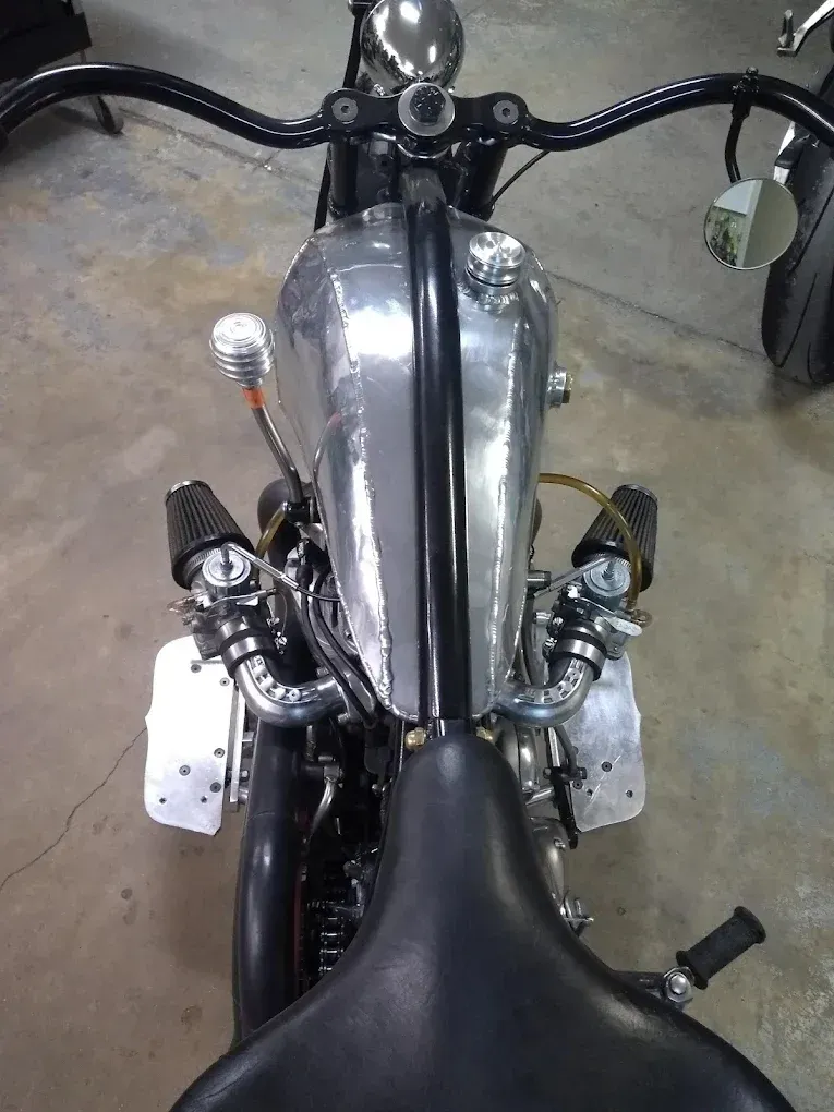 A close up of a motorcycle with a black seat