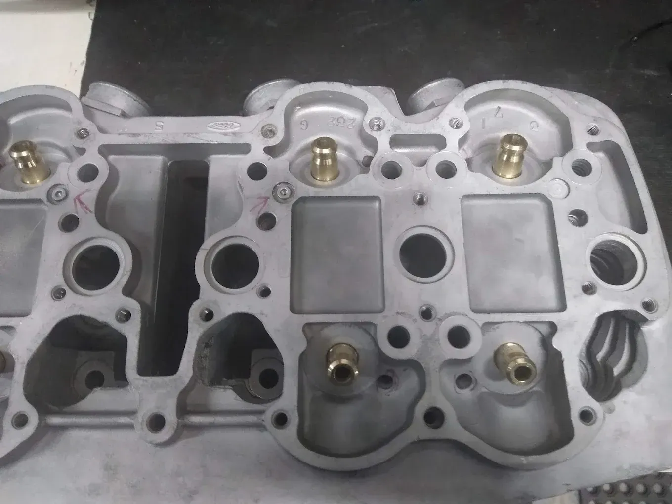 A close up of a piece of metal with holes in it