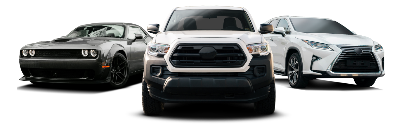 Three vehicles: a gray Dodge Challenger, a white Toyota Tacoma, and a white Lexus RX. | Moorhead Automotive