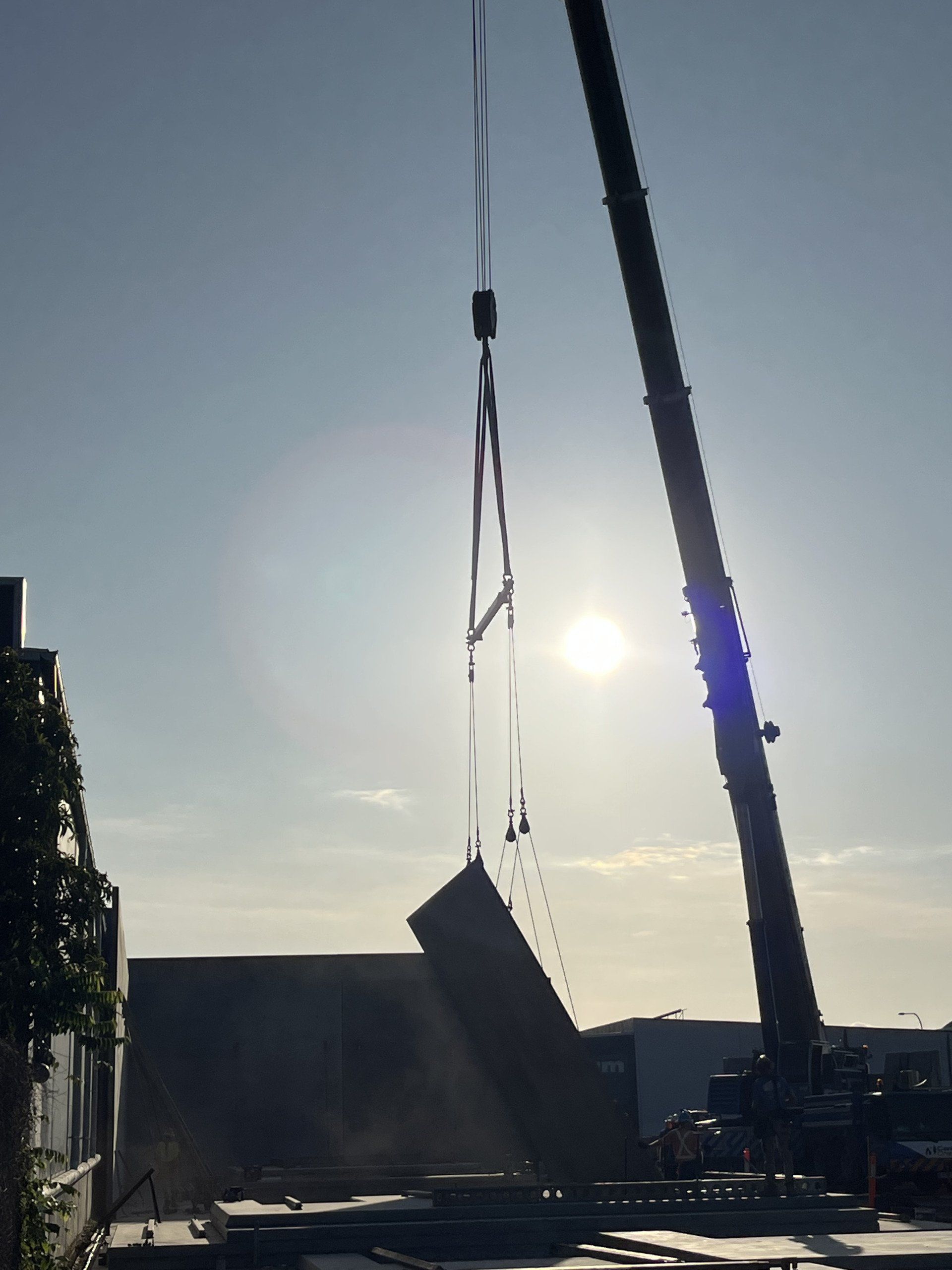 Huge Crane Lifting Concrete Slab — Redlynch, QLD — Wes Mansfield Construction