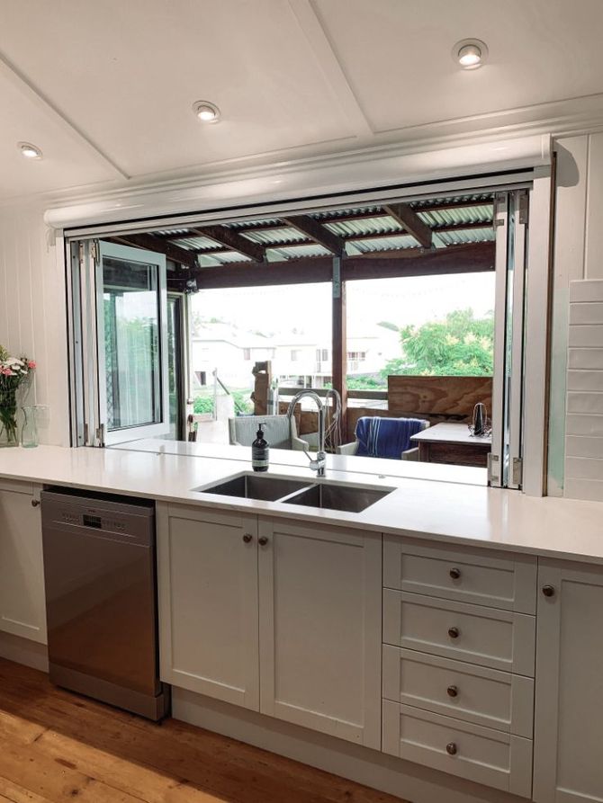 Aluminium Bi Fold Kitchen Window — Richters Joinery in Bundaberg, QLD
