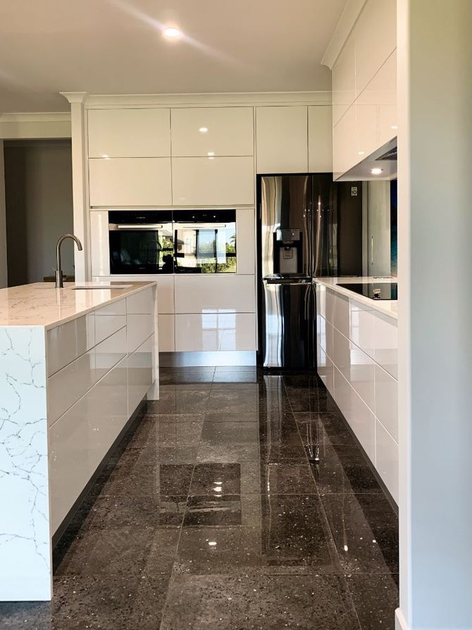 Shiny Kitchen Floor and Cabinets — Richters Joinery in Bundaberg, QLD