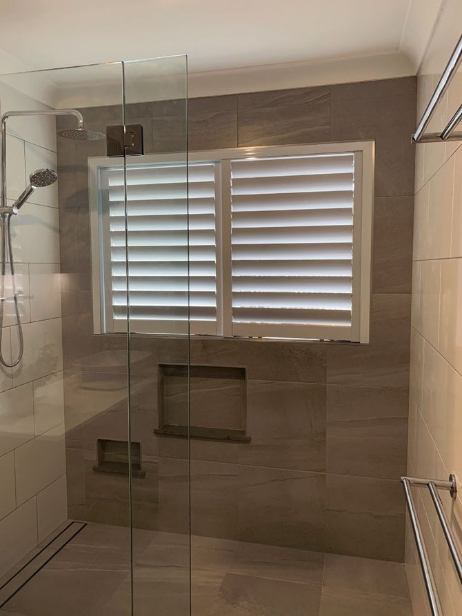 Shower Room With Window Blinds — Richters Kitchens & Glass in Bundaberg, QLD