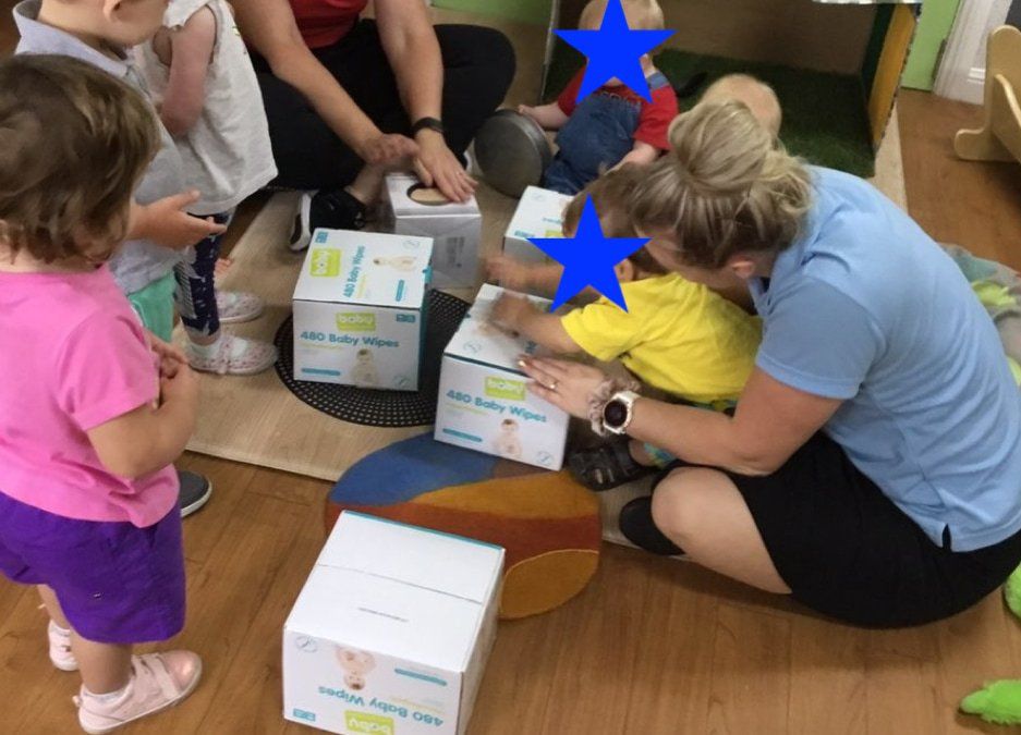 Kids Playing Drums Using The Boxes — Early Childhood Education in Central Coast, NSW