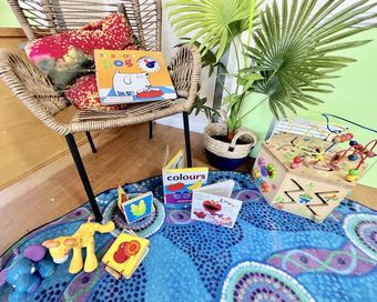Colourful Books And Wooden Toy — Early Childhood Education in Central Coast, NSW