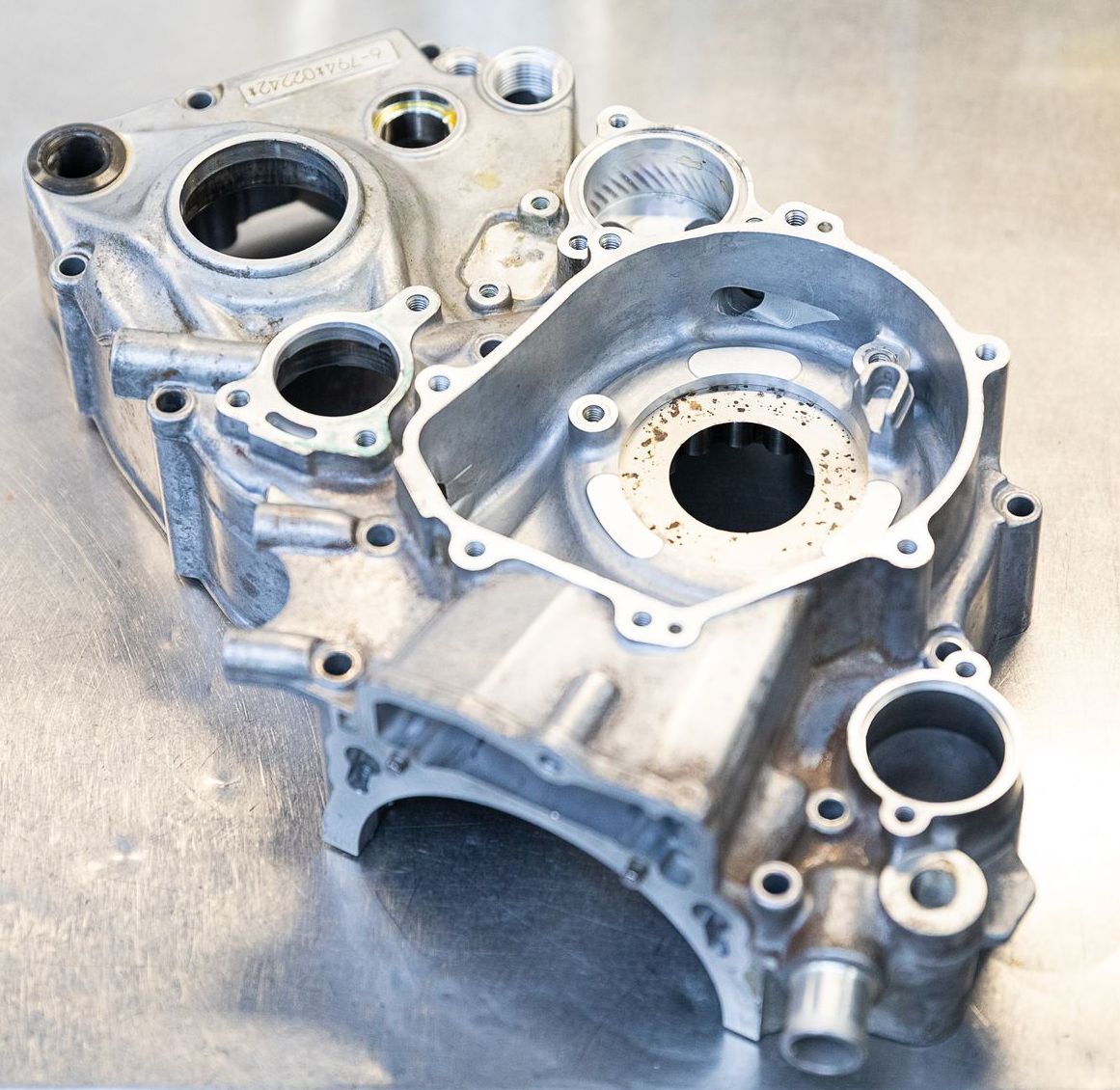 A close up of a motorcycle engine case on a table