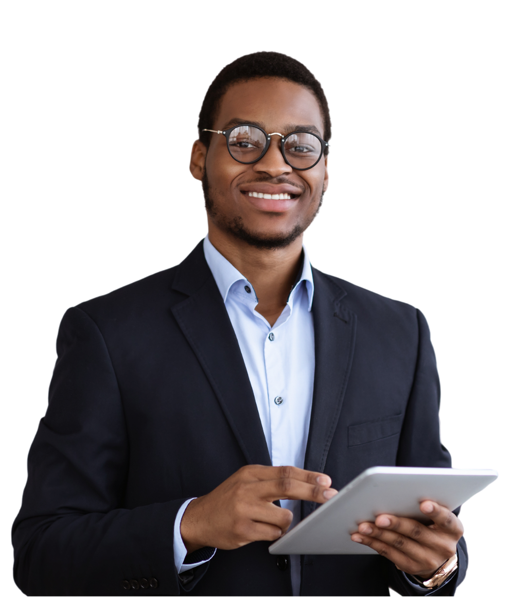 A man in a suit is holding a tablet and smiling.