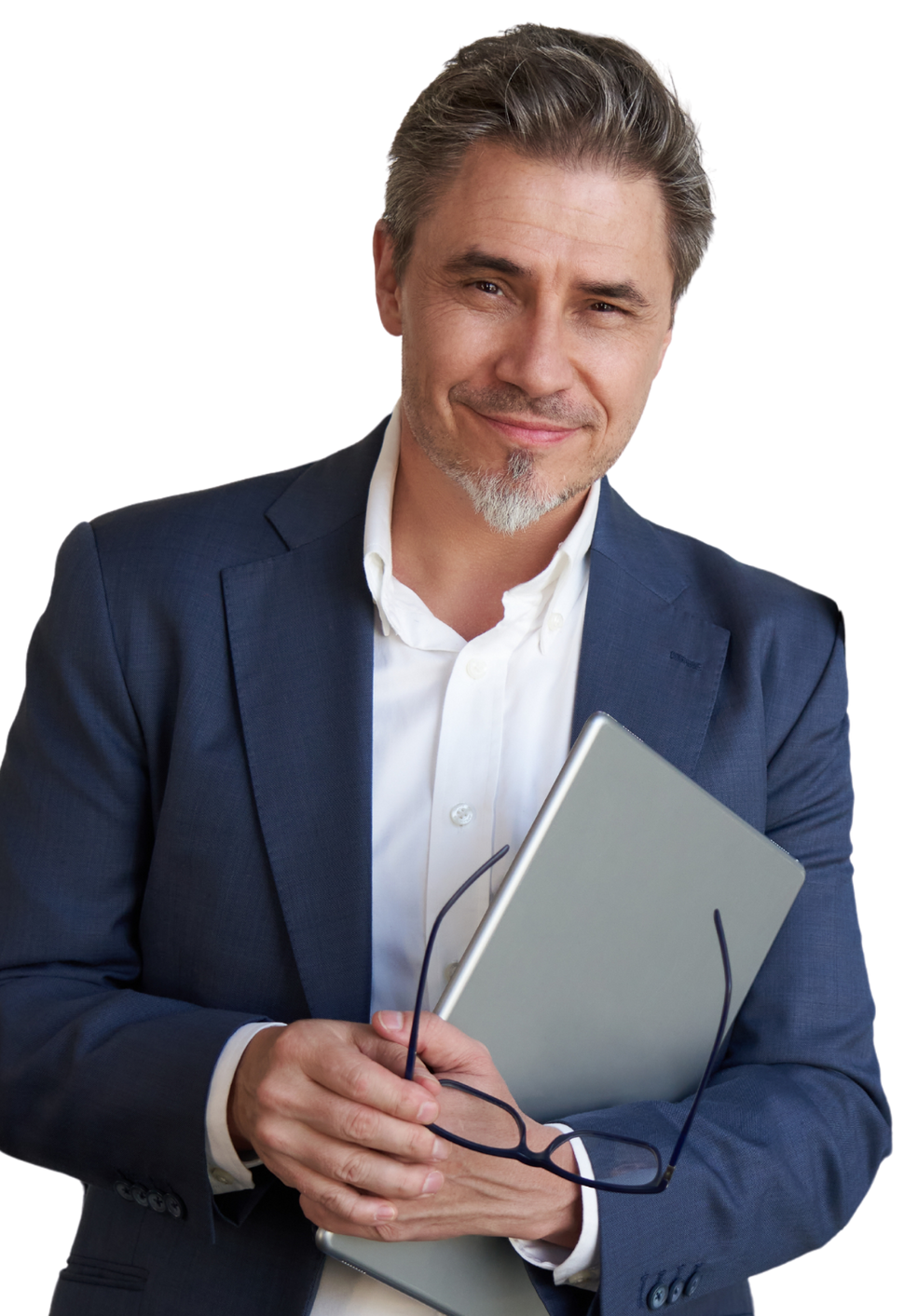 A man in a suit is holding a book and glasses.