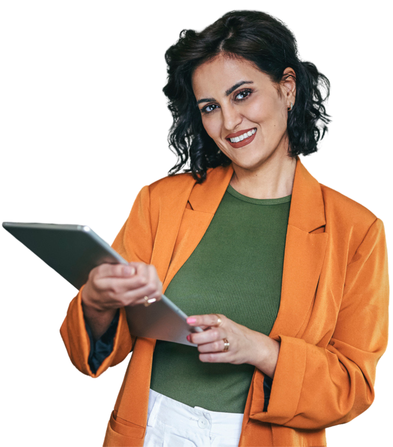 A woman in an orange jacket is holding a tablet and smiling.