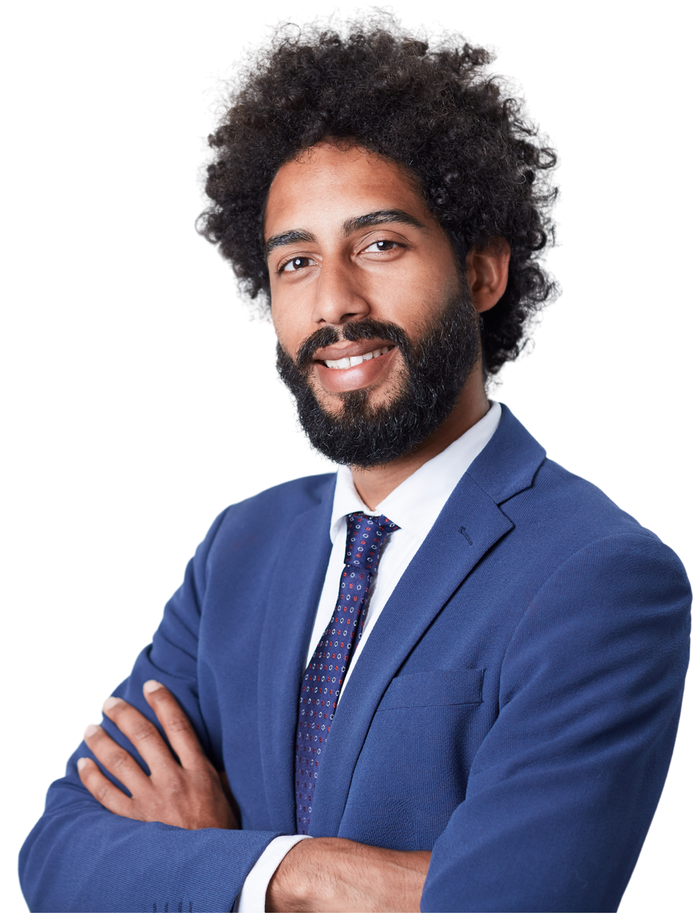 A man in a blue suit and tie with his arms crossed