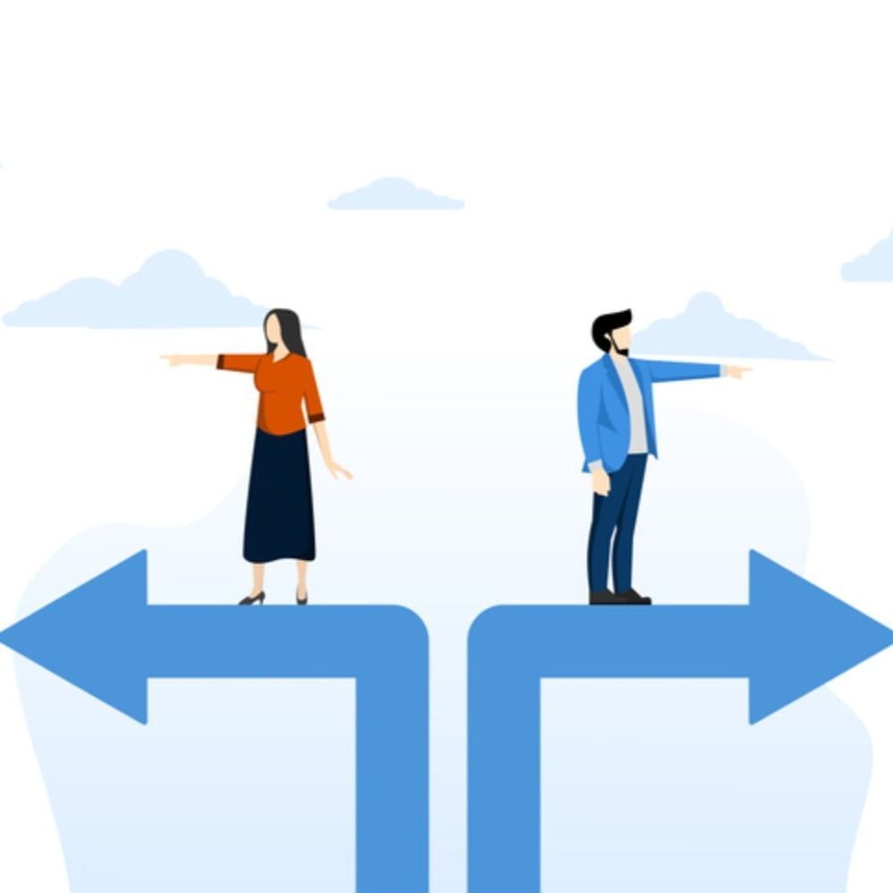 A man and a woman are standing on two arrows pointing in opposite directions.