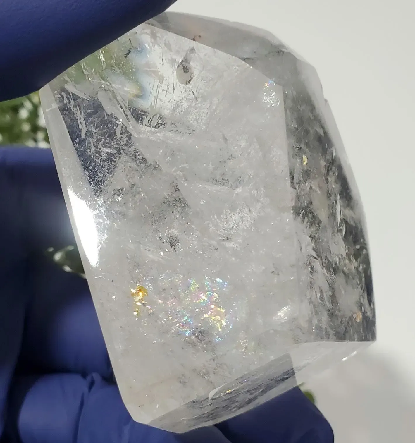 Clear quartz free-form full of Rainbows 116g