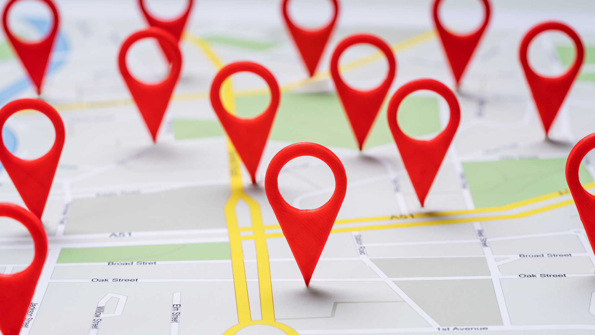 Red map pins marking multiple locations on a street map