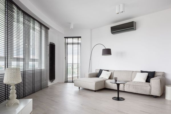 Living Room with a Couch and Air Conditioner | East Gosford, NSW | Clark’s Insulations 