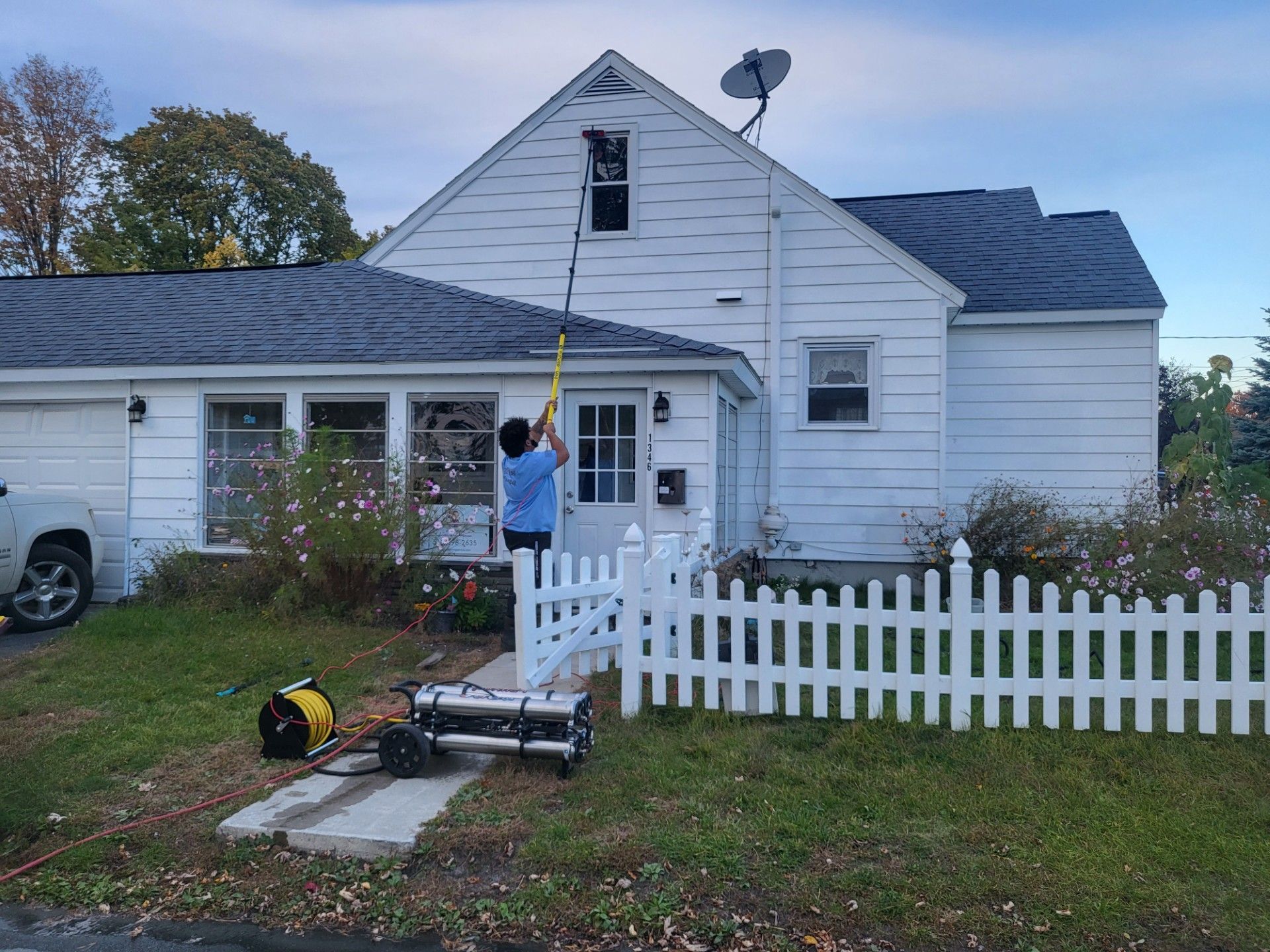 Woman Cleaning Window — Schenectady, NY — Paige's Janitorial Cleaning Service and Floor Care