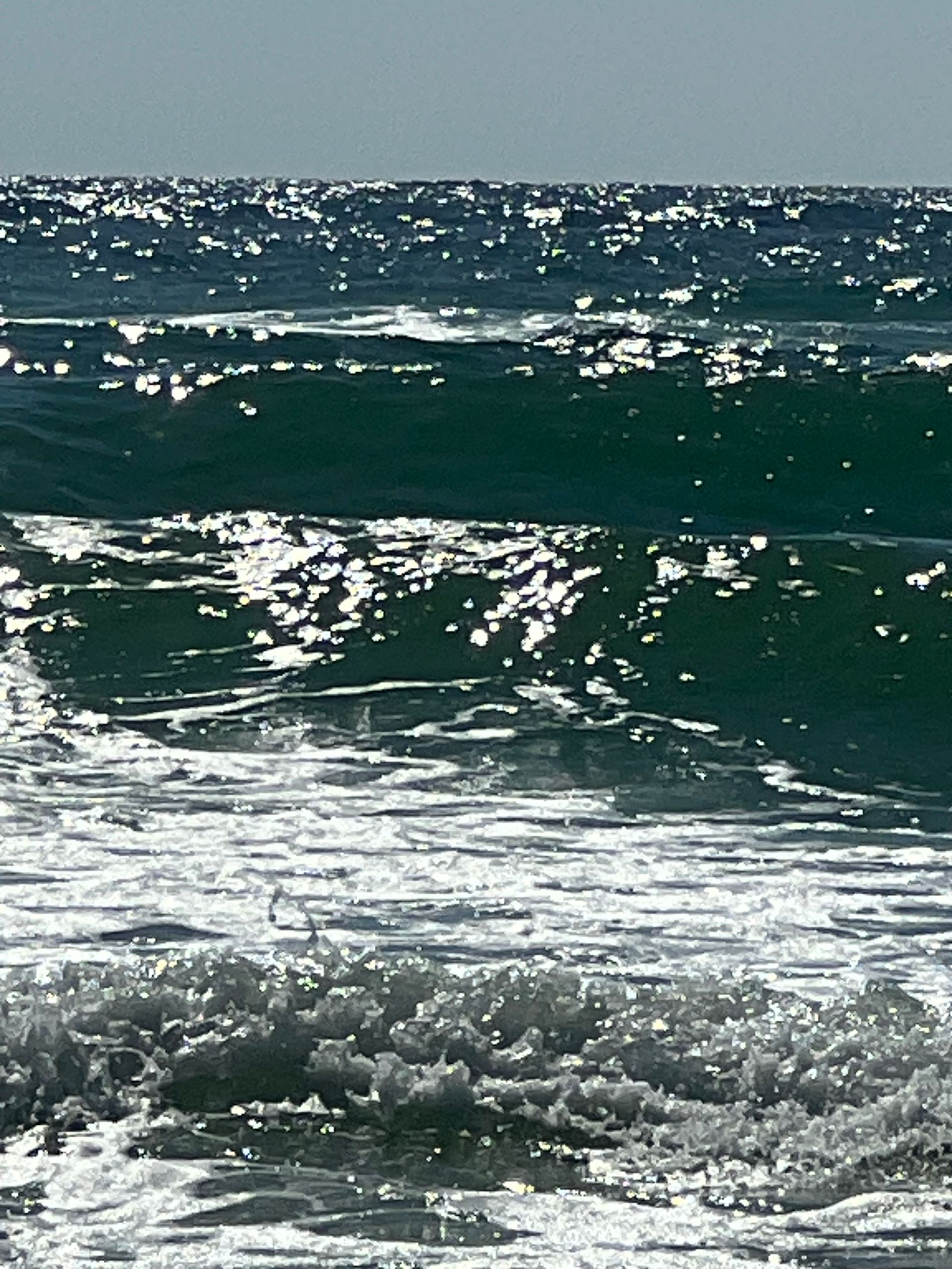 A close up of a wave in the ocean