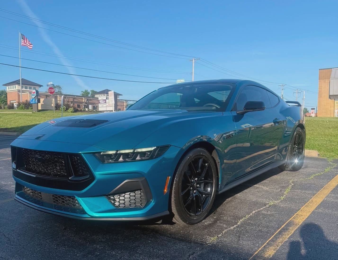 Teal Ford Mustang Dark Horse after ceramic coating and window tint in St. Peters, MO