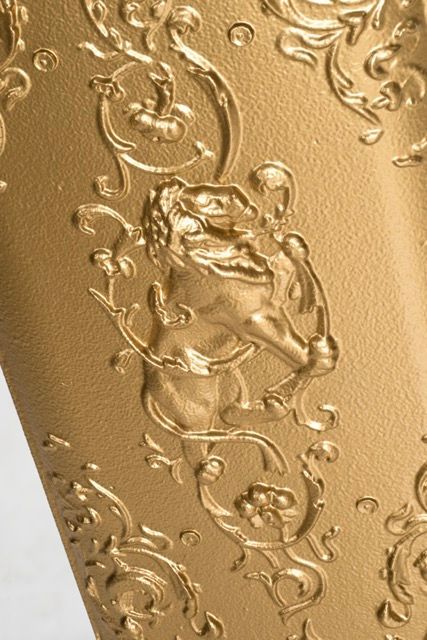 Detaildarstellung des Löwen auf dem Gussheizkörper FORTUNA