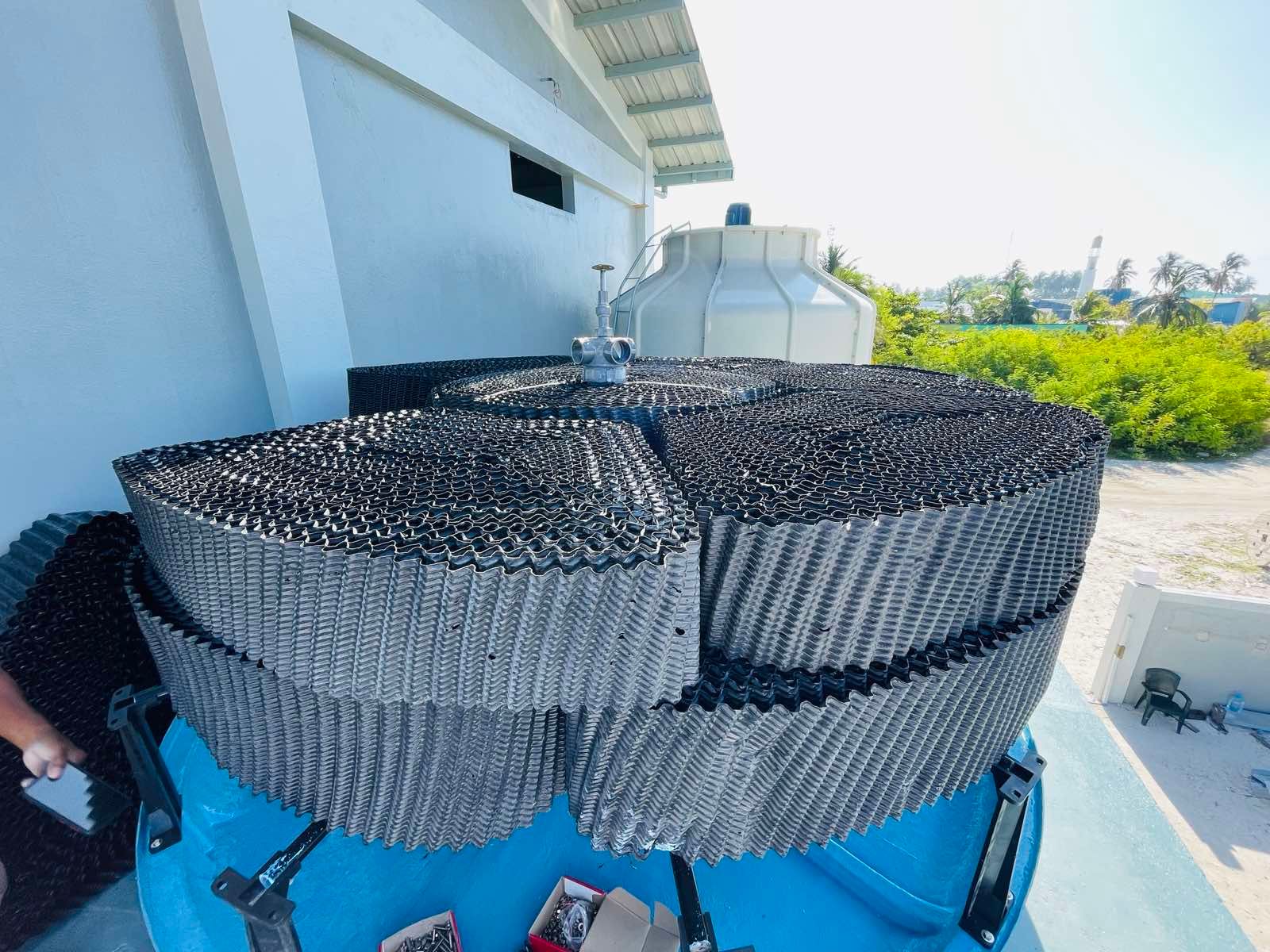 A large circular object with a lot of wires on it
