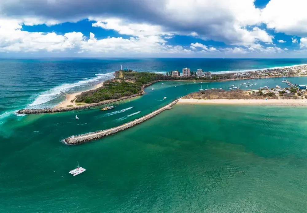 An Aerial View of a Small Island in the Middle of the Ocean — Superstretch300 Limousines In Mooloolaba, QLD