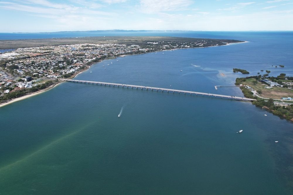 Aerial View Of A Long Bridge Over Dark Blue Water — Superstretch300 Limousines In Caloundra, QLD
