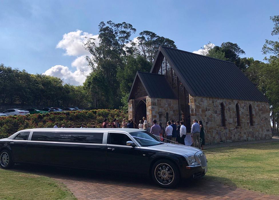 Wedding Limousine in Front of the Church — Superstretch300 Limousines in Sunshine Coast, QLD