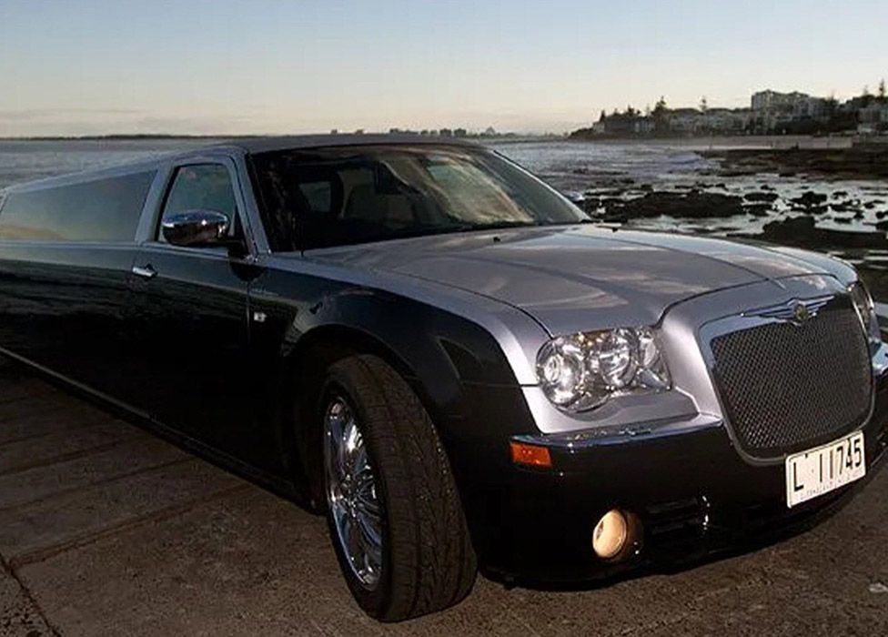 Black Limousines on the Beach — Superstretch300 Limousines in Sunshine Coast, QLD 