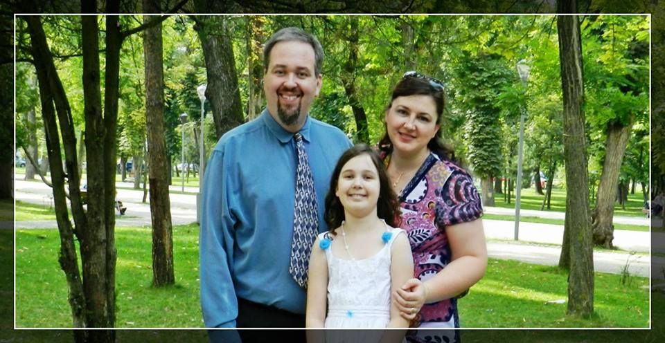 A picture of the Brunnel Family, Dave, Lilly, and their Daughter.