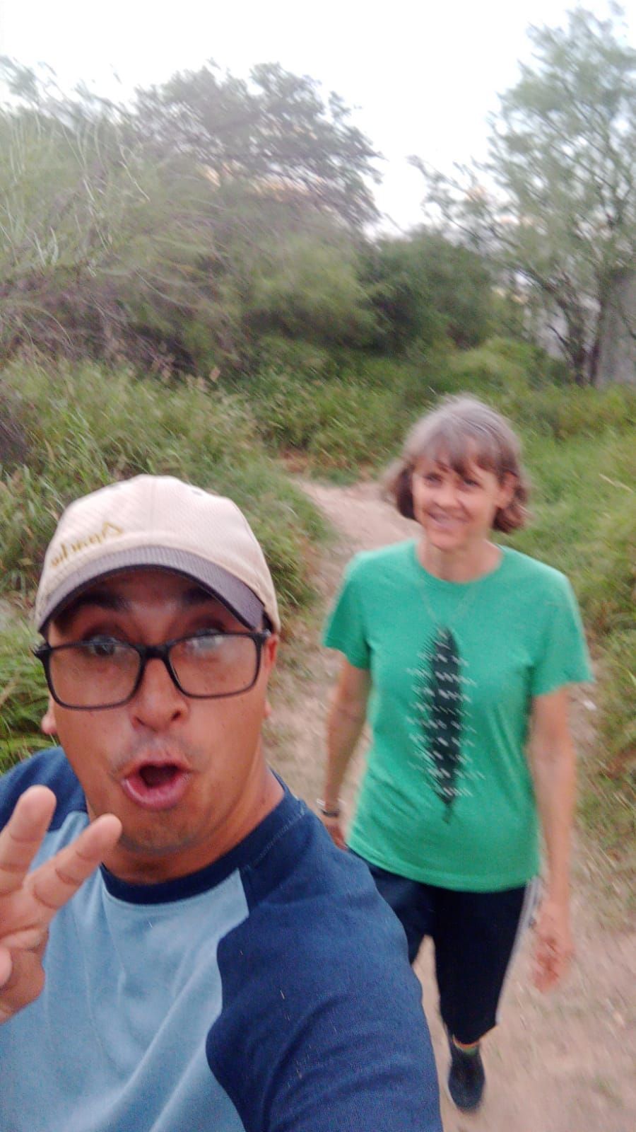 Pastor Chuy and Holly hiking