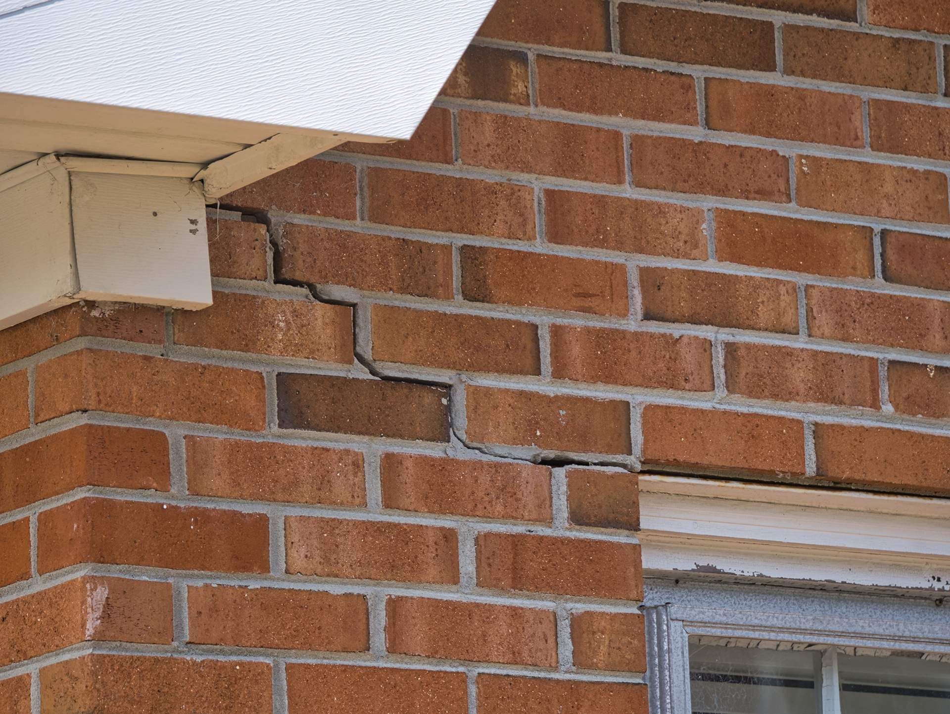 house settling causing bricks crack