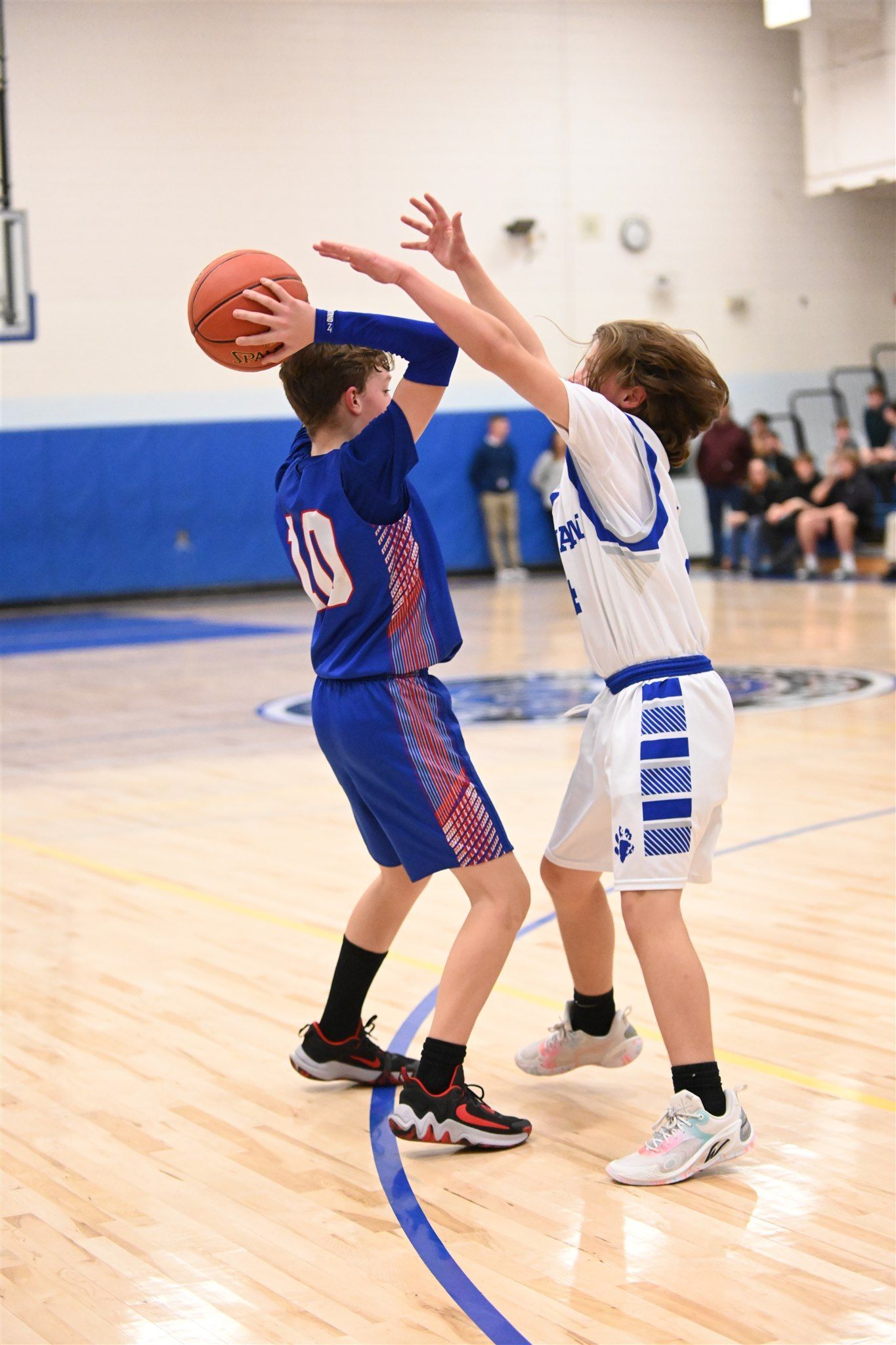member of the 2023-24 boys basketball team on the court