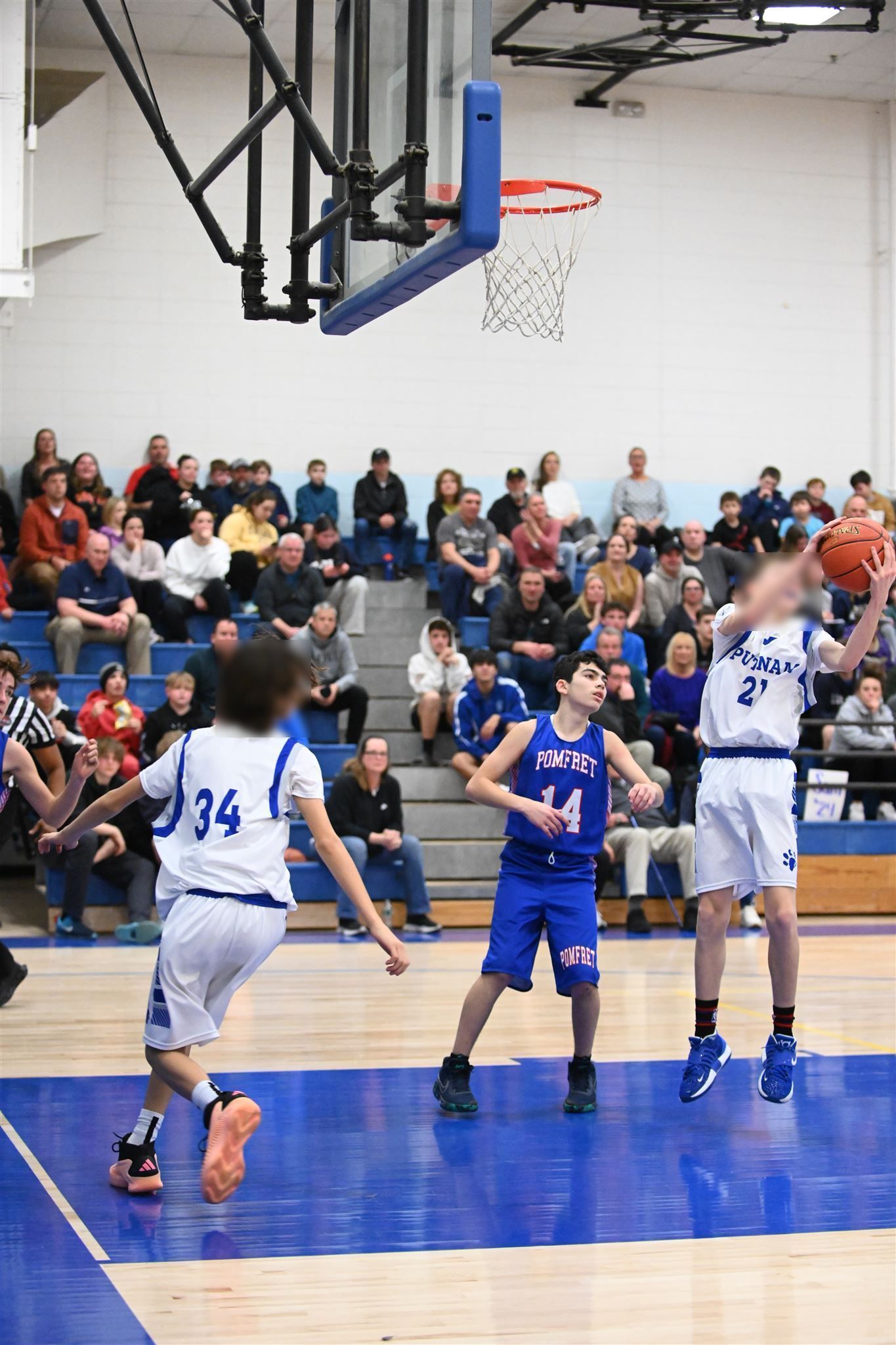 member of the 2023-24 boys basketball team on the court