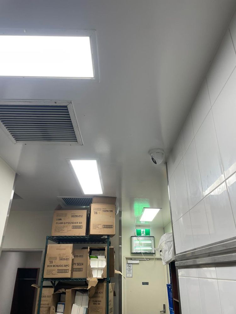 Kitchen with Boxes and Newly Painted Walls