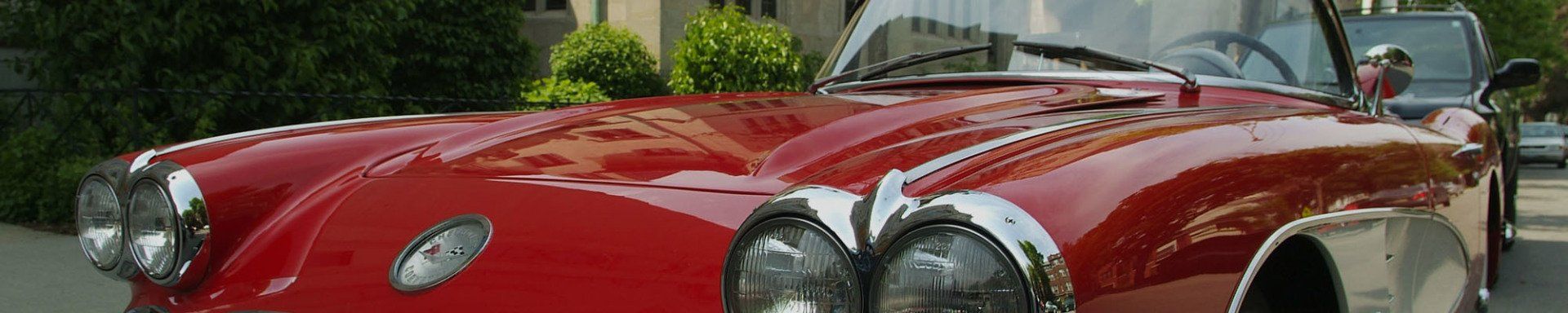 Close up shot of a vintage red car