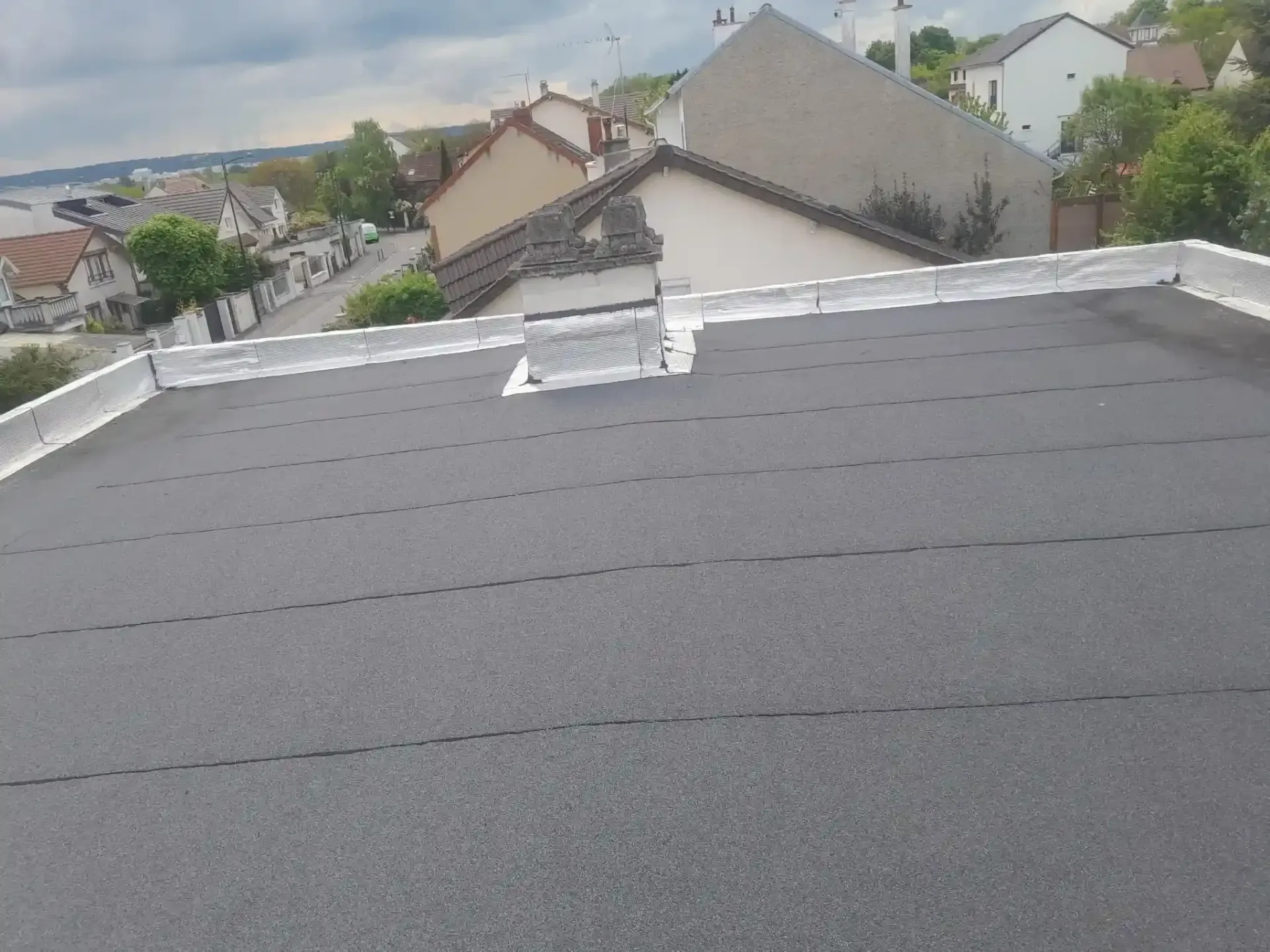 TAGLINE Toiture remise à neuf