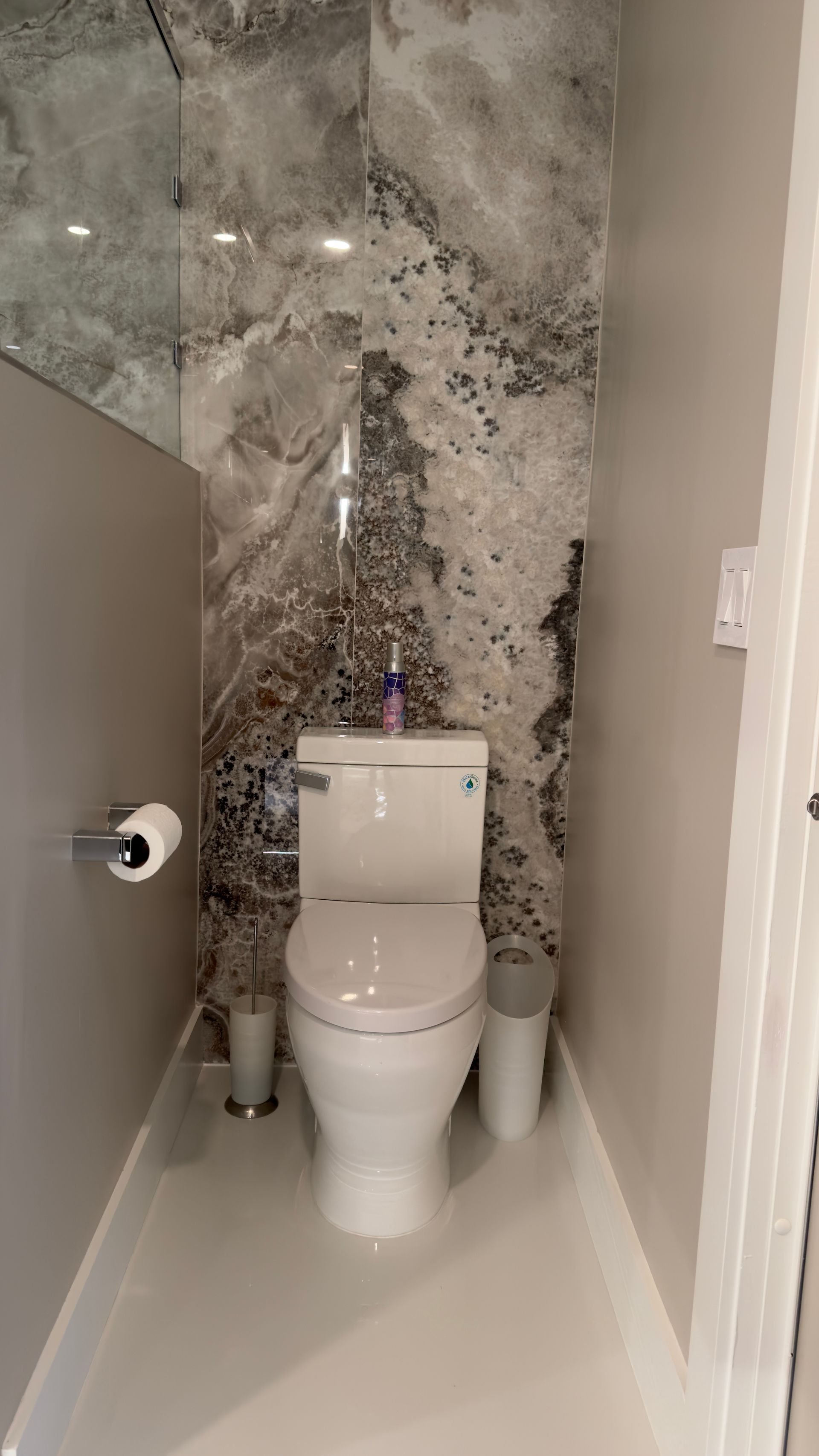 Toilet area separated by a wall for privacy