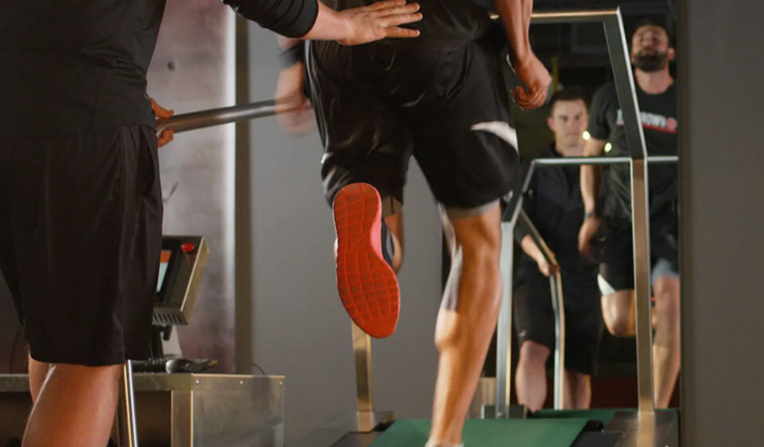man running on athletic republic franchise treadmill