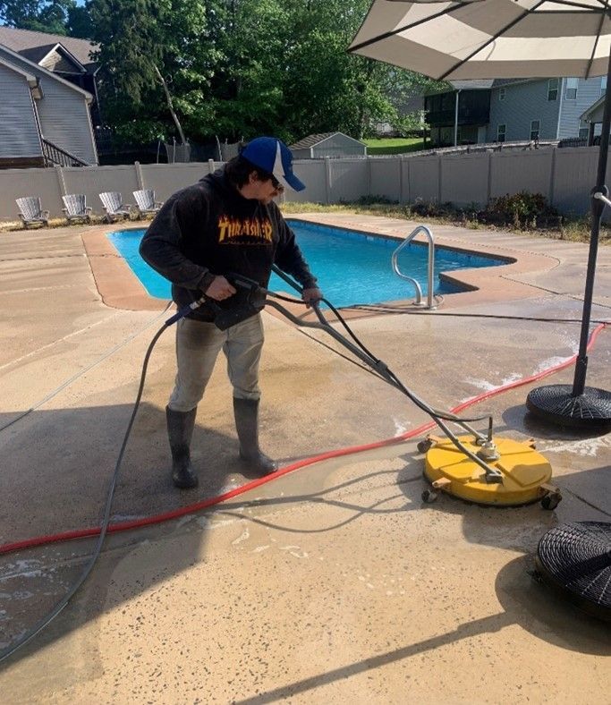 Professional cleaning of outdoor stone patio using pressure washer — Chattanooga, TN — Under Pressure Pressure Washing Professional cleaning of outdoor stone patio using pressure washer — Chattanooga, TN — Under Pressure Pressure Washing