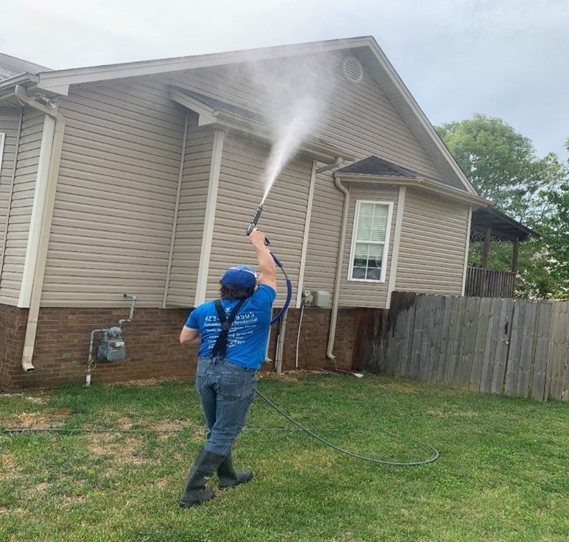 Professional pressure washing the exterior of a home — Chattanooga, TN — Under Pressure Pressure Washing
