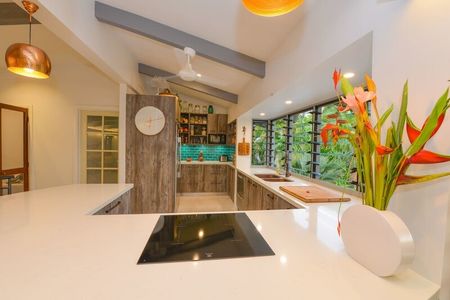 Modern Kitchen with Dark Brown Cabinetry  — Cabinet Design in Berrimah, NT