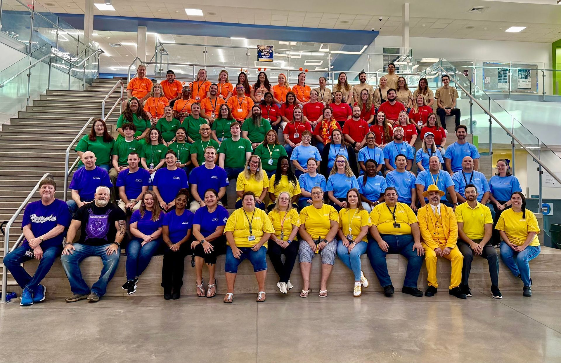 Nations Roofing & Construction sponsoring staff shirts at Angeline Academy of Innovation