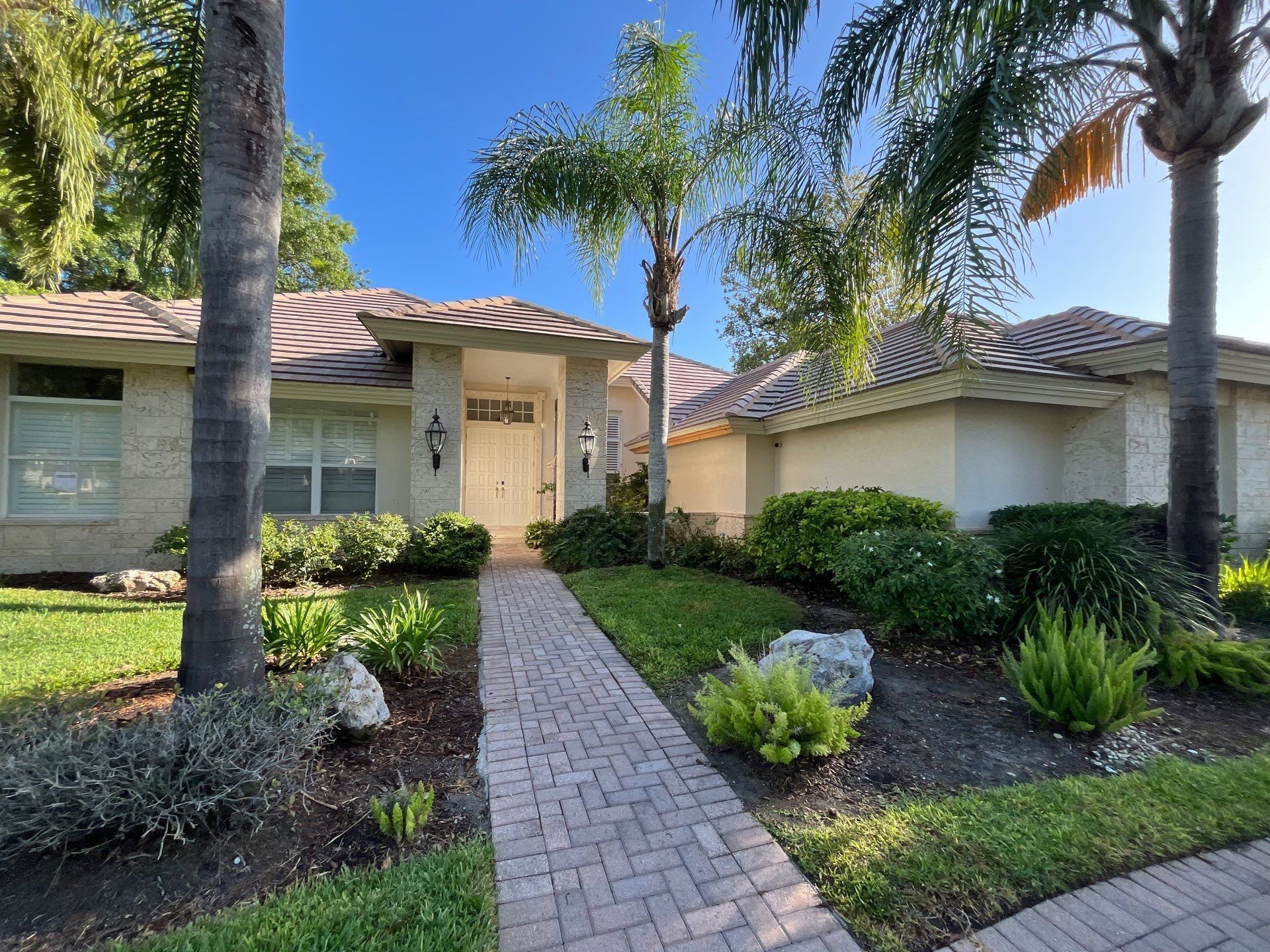 Roof replacement in Oak Creek HOA of Wesley Chapel, FL installed by Nations Roofing & Construction.