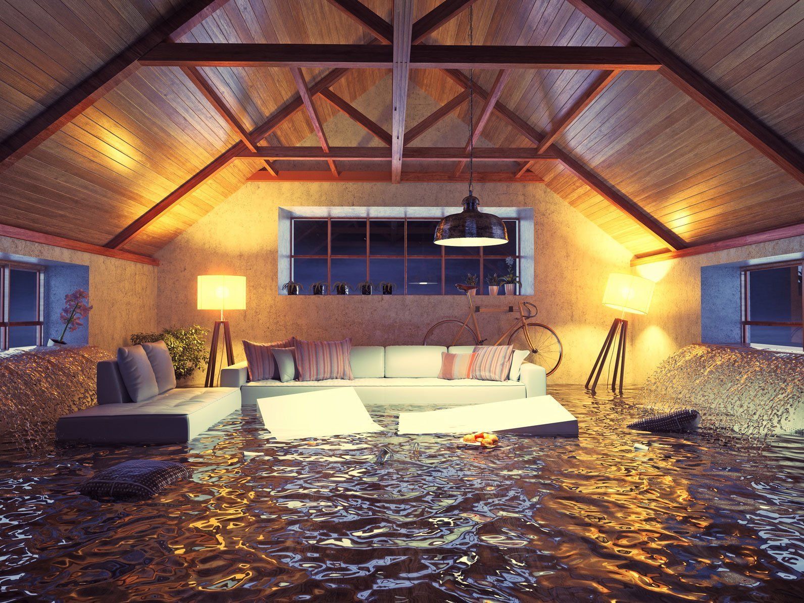 A living room filled with water and a couch.