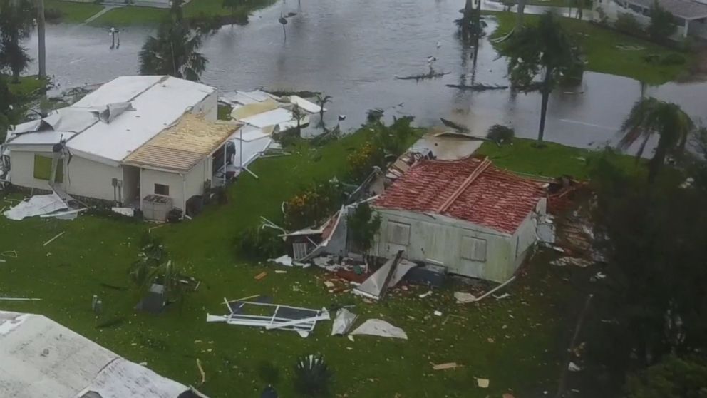 An aerial view of a house that has been damaged by a hurricane.