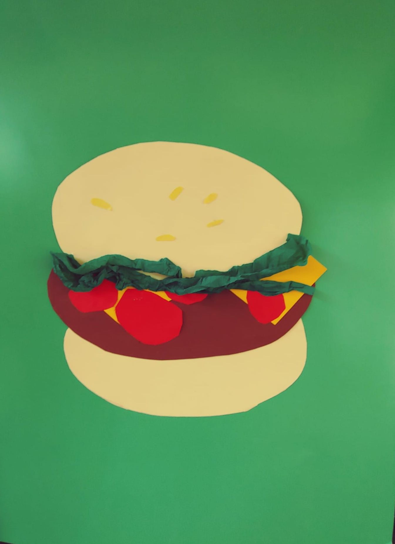 hamburger geplakt met papier