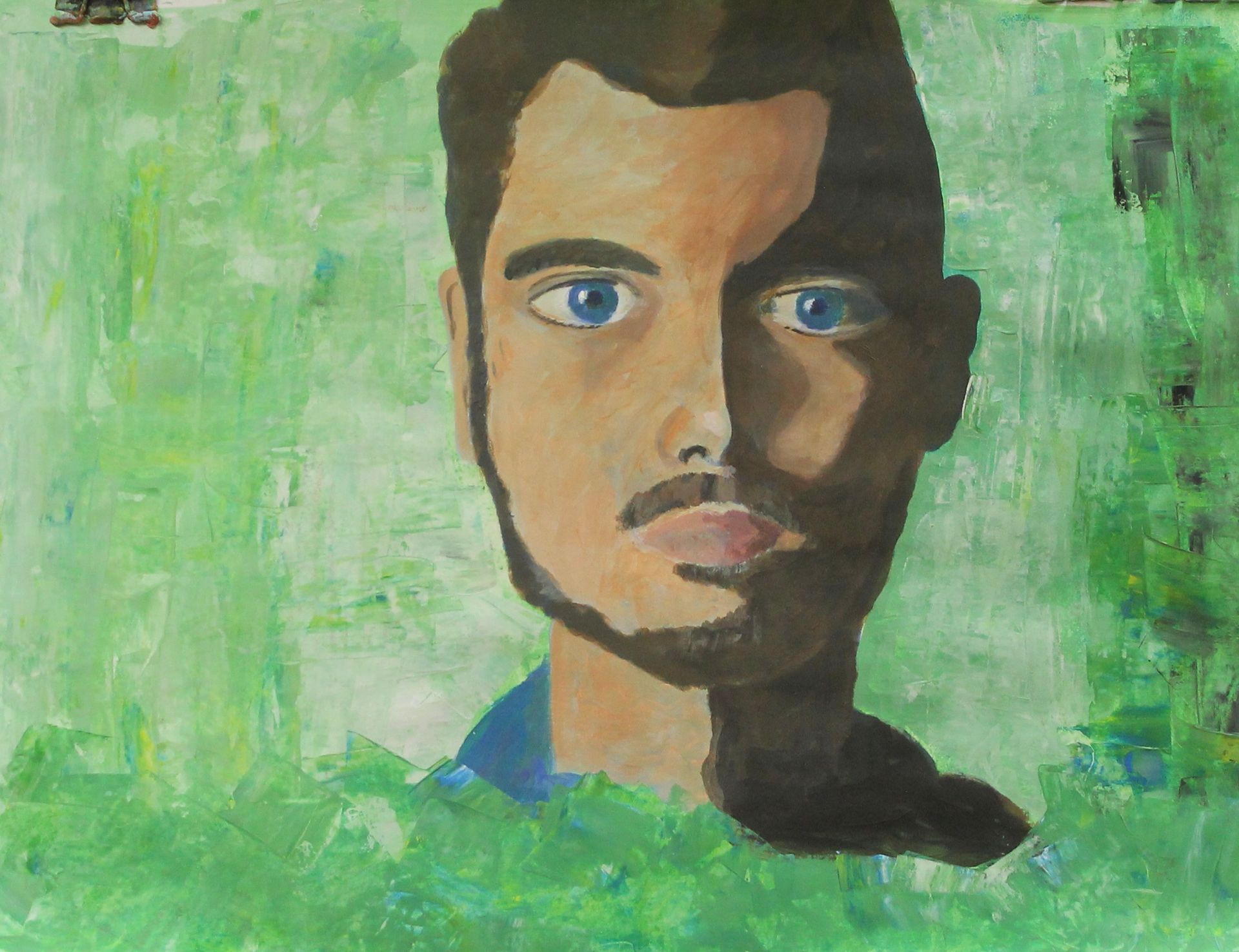 Een schilderij van een man met blauwe ogen en een baard