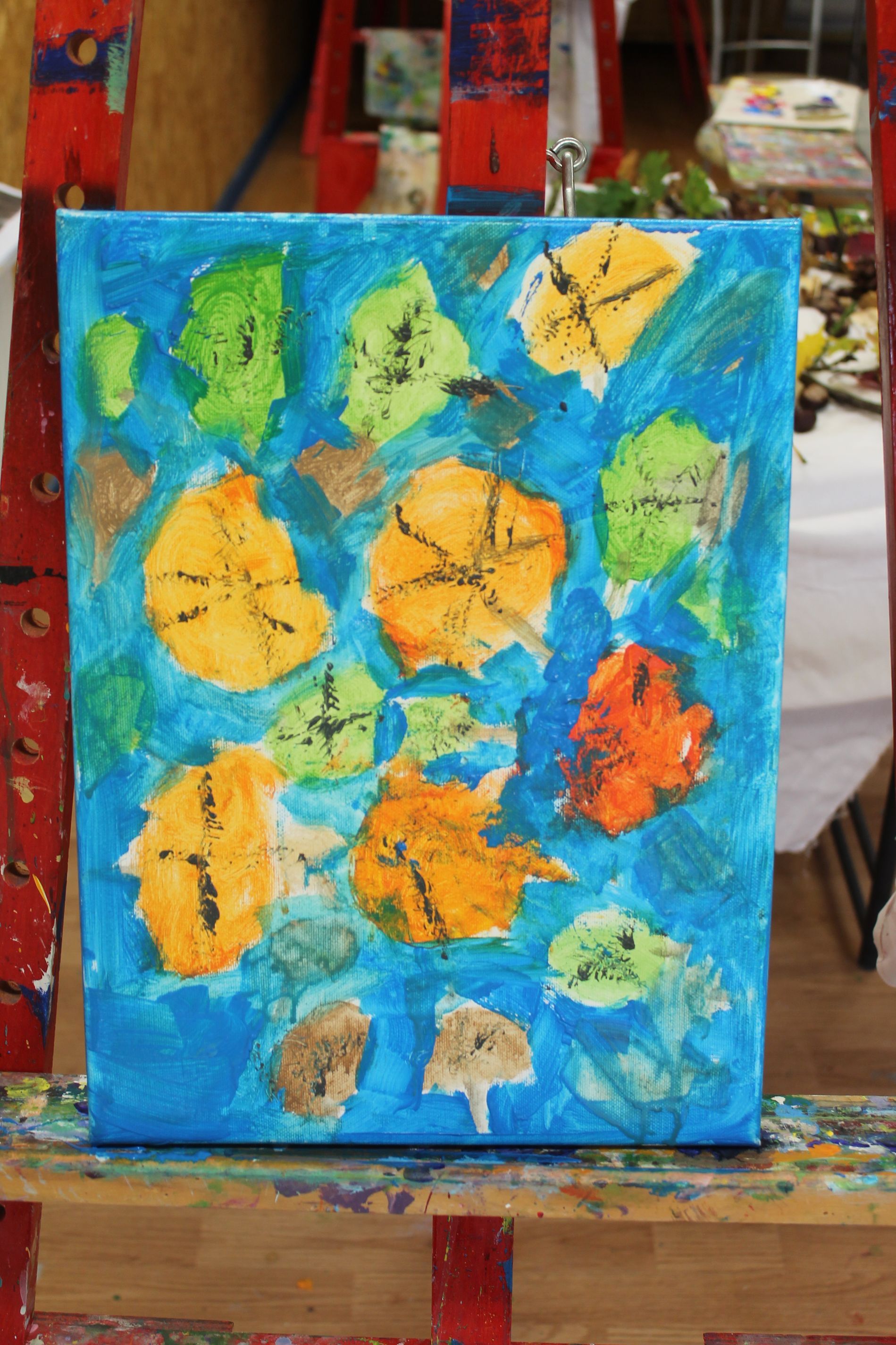 herfstbladeren op schilderdoek met acrylverf