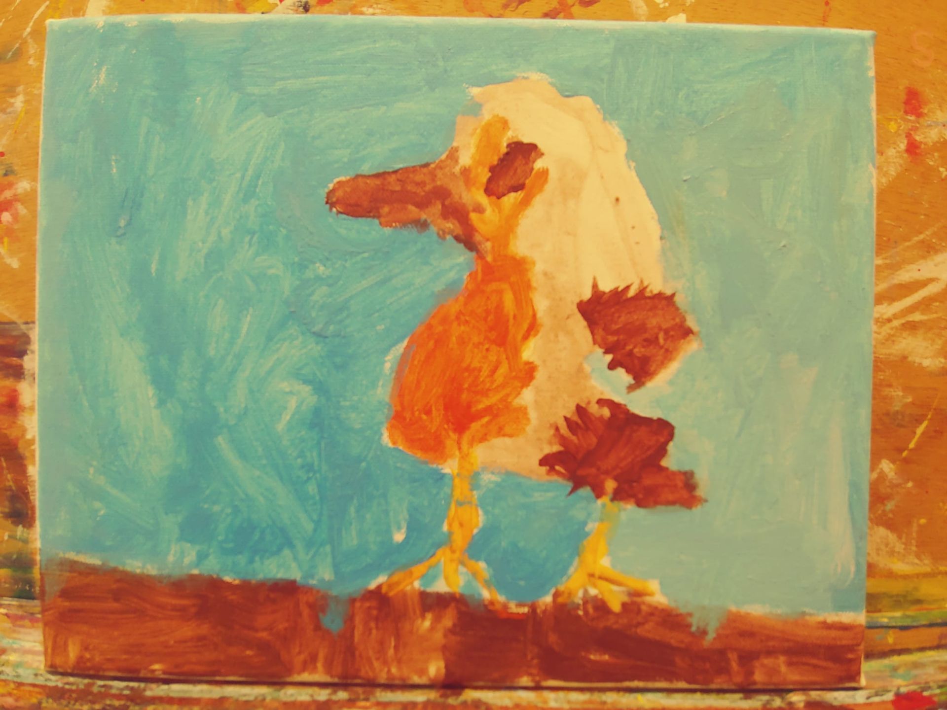 Een schilderij van een roodborstje