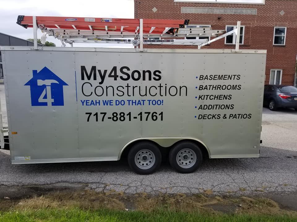 Silver construction trailer with
