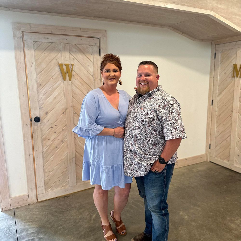 Kelby and Erin Winberry of M&W Outdoor Services in NWA